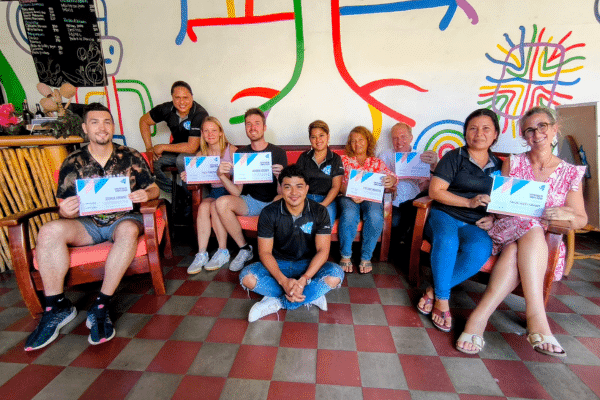 - Students attending an in-person Spanish class with a native-speaking teacher